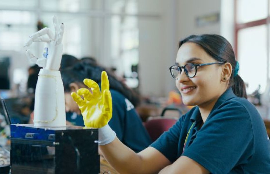 Arya College of Engineering Student With bionic hand